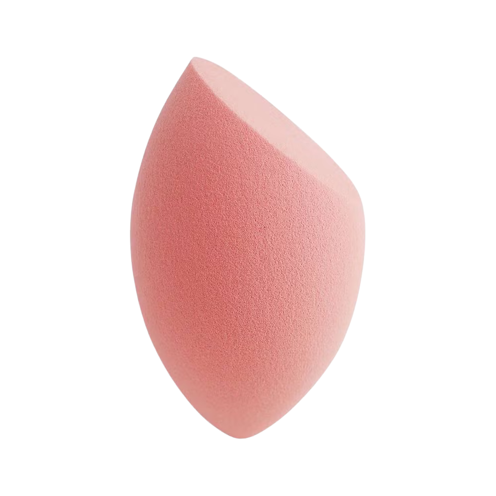 Pink makeup sponge on a white background